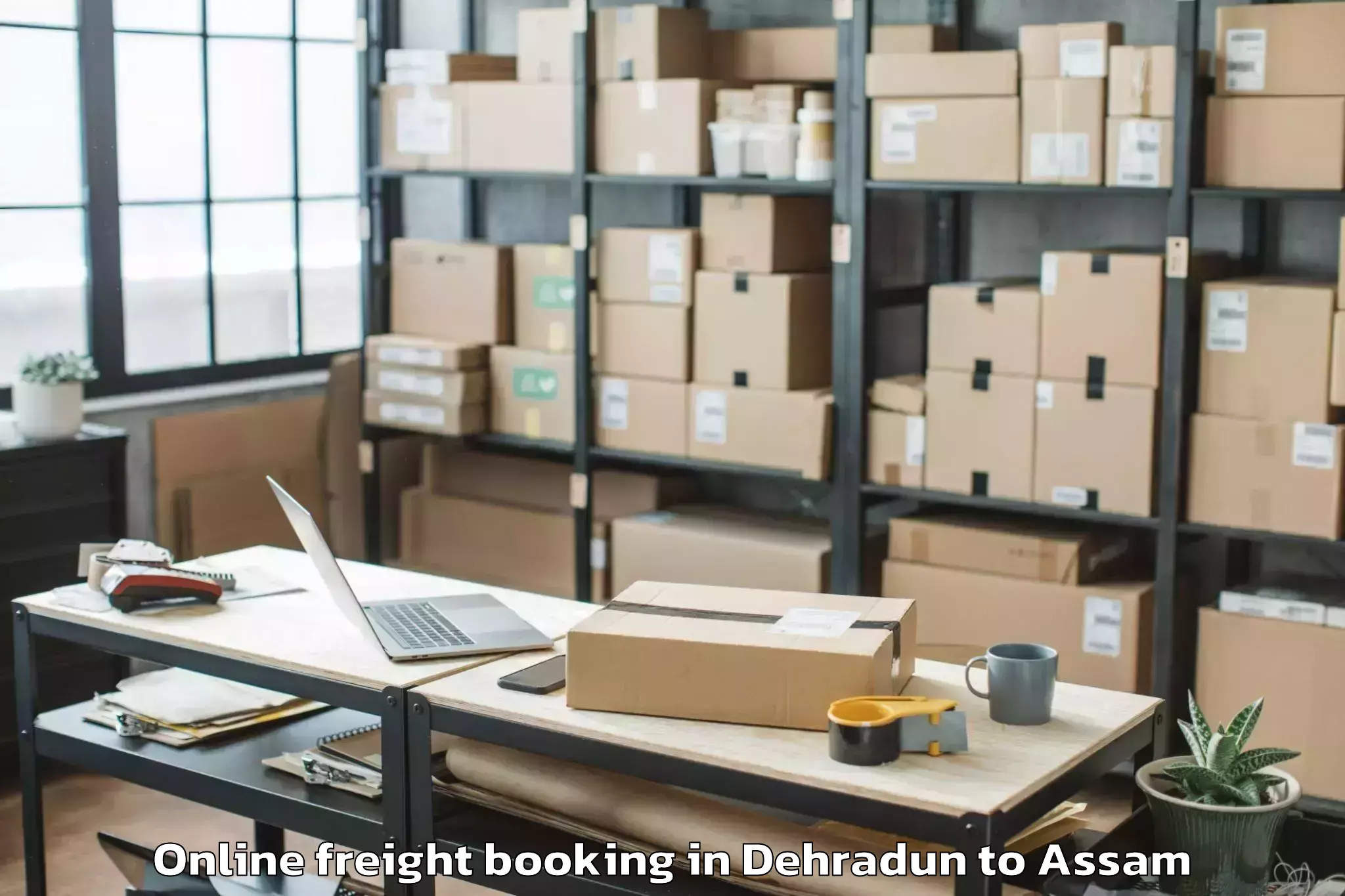 Trusted Dehradun to Dergaon Online Freight Booking